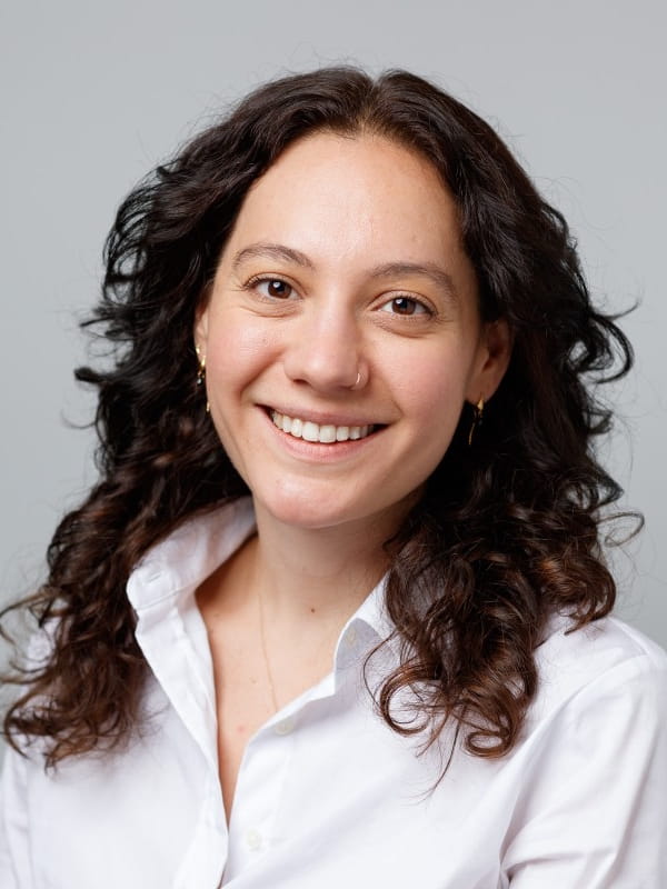 Example staff headshot — warm, approachable, professionally lit